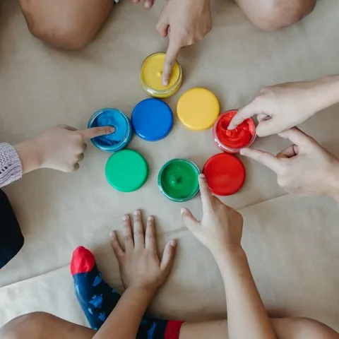 Finger-painting, colour by colour